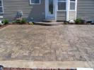 Grand Ashlar Slate stamped patio with unstamped boarder in Delaware, Ohio.